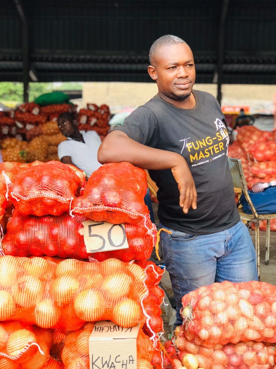 Brian Lupiya Standing next to his merchandise in Soweto market, Lusaka province Brian Lupiya Standing next to his merchandise in Soweto market, Lusaka province