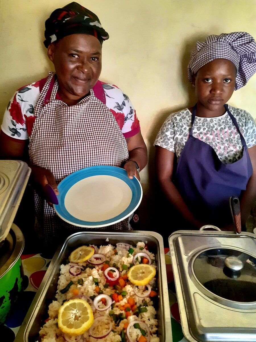 Namenda in the restaurant with one of her employees Namenda in the restaurant with one of her employees