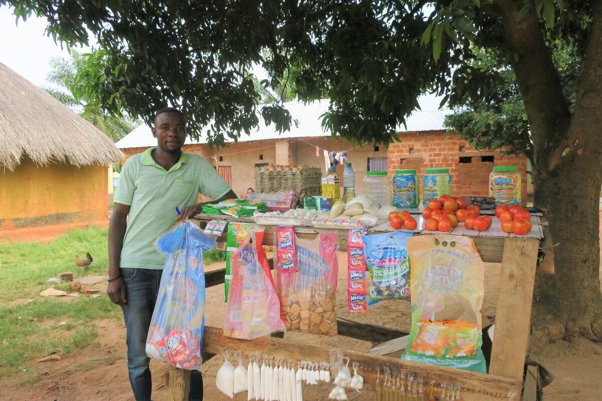 George at his grocery stand in Nchelenge, Luapula Province George at his grocery stand in Nchelenge, Luapula Province
